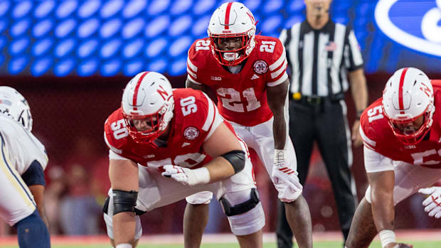 Nebraska running back Emmett Johnson and offensive guard Rocco Spindler line up for a play against Akron on Sept. 6, 2025.