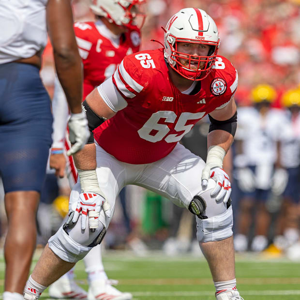 Nebraska offensive lineman Teddy Prochazka prepares to block against Michigan.