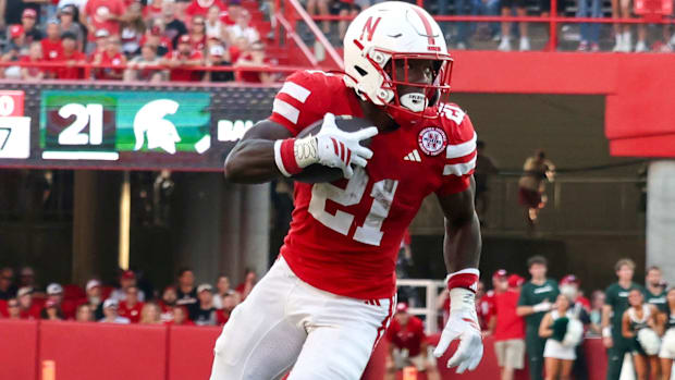 Nebraska running back Emmett Johnson carries the ball vs. Michigan State on Oct. 4, 2025.
