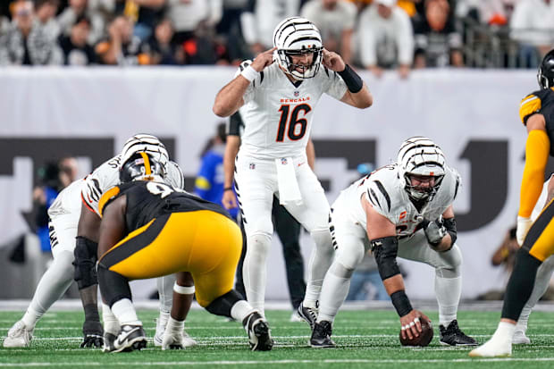 Joe Flacco gestures before a snap