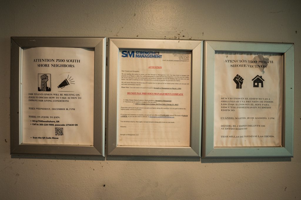 Meeting notices for residents on a wall of the apartment building at 7500 S. South Shore Drive in South Shore on Oct. 1, 2025. The building was raided by federal agents the morning before.