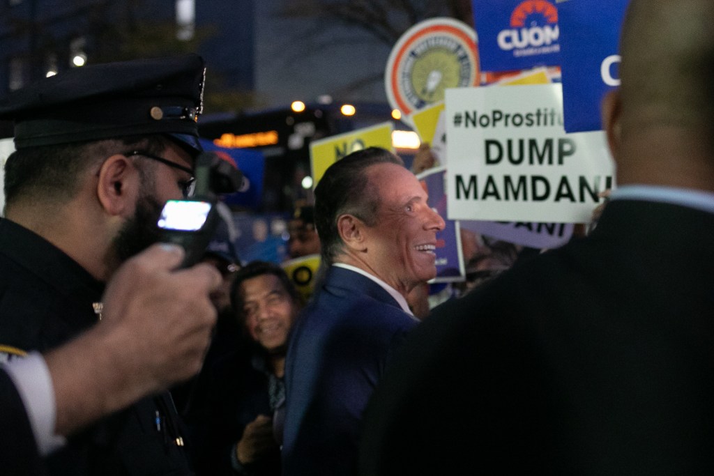 Mayoral candidate Andrew Cuomo greets supporters ahead of the final mayoral debate at LaGuardia College in Queens