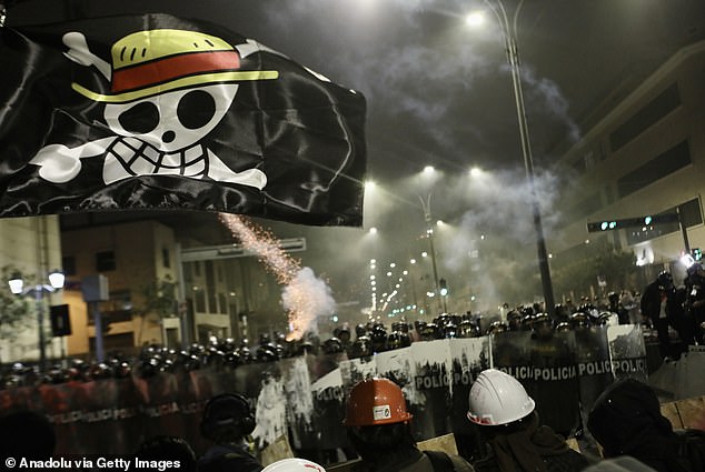 Mostly Gen Z demonstrators clash with members of Peruvian police during a national protest