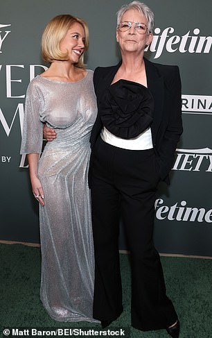 Sweeney and Curtis held smiles on their faces as they had a friendly embrace