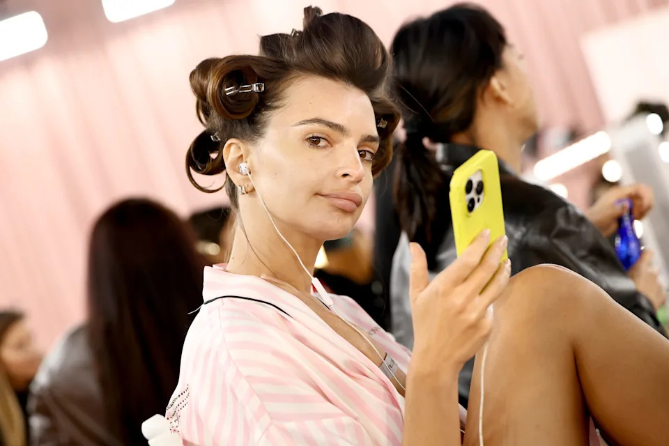 Emily Ratajkowski prepares backstage at the Victoria's Secret Fashion Show 2025 on October 15, 2025 in New York City.