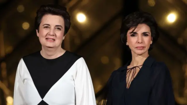 Laurence des Cars and Rachida Dati attend the "Le Grand Diner du Louvre" Passage Richelieu Photocall at Musee du Louvre on March 04, 2025