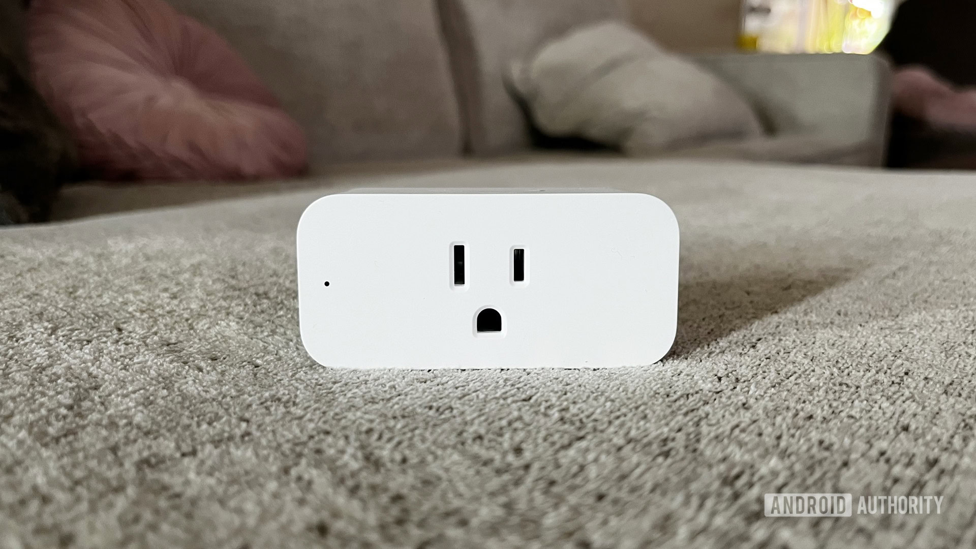 Amazon Smart Plug Couch A beauty shot of the Amazon Smart Plug on a couch