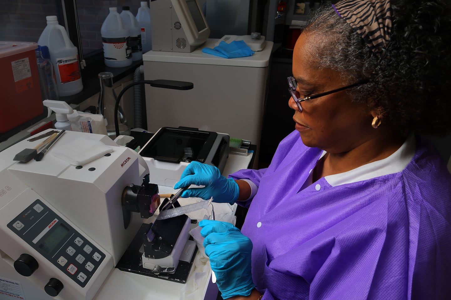 Lab manager Myrtha Constant prepared tissue samples in the Histopathology Lab.
