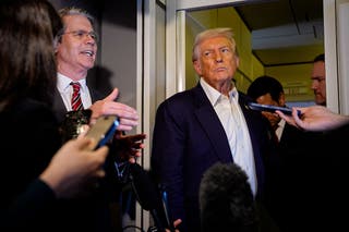 Scott Bessent, the U.S. Treasury secretary, and President Donald Trump speak to reporters