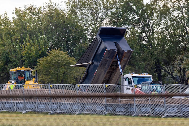 Trump is reportedly trucking the debris from the East Wing demolition to create mounds at a public Washington D.C. golf course.