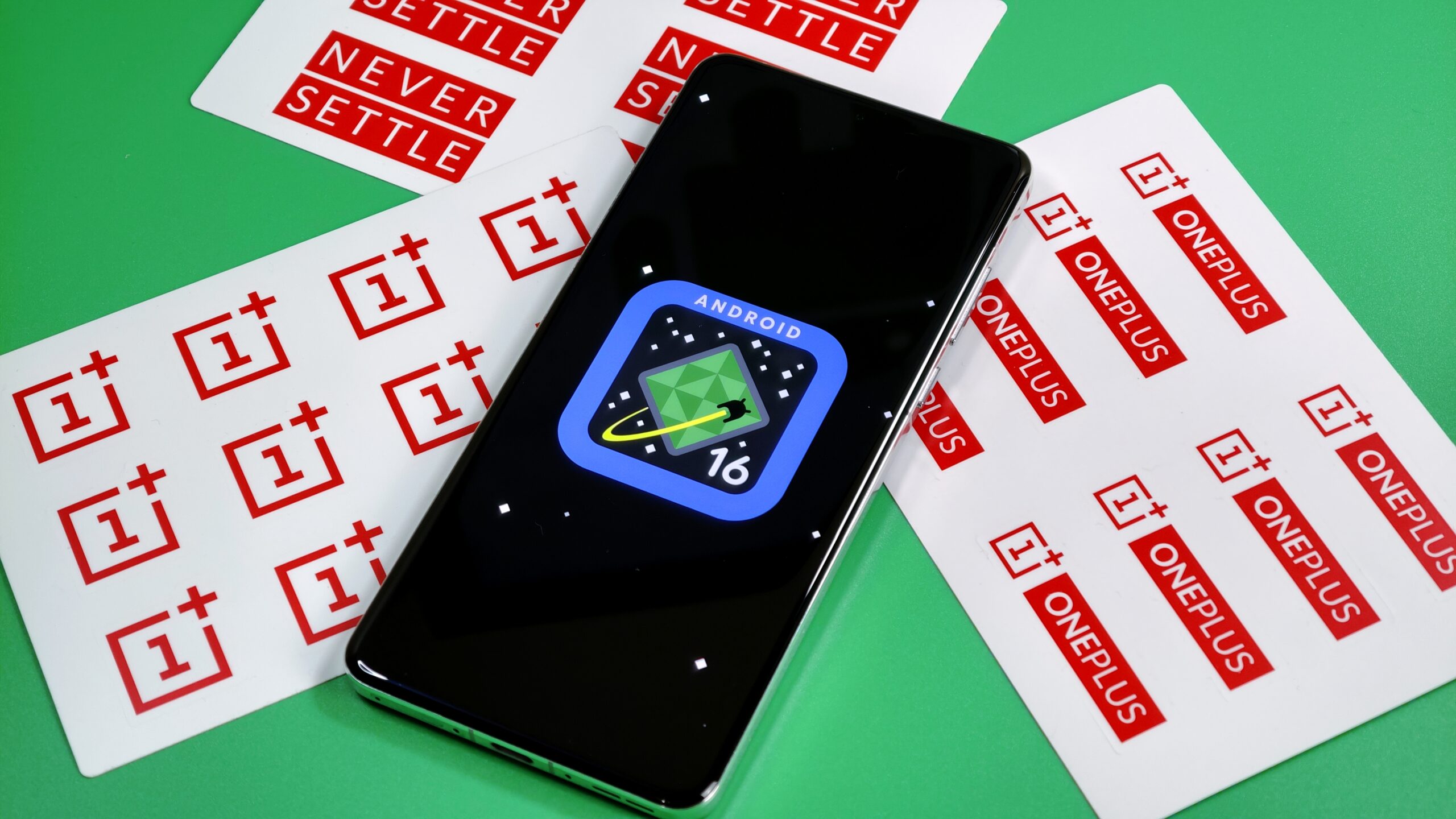 Photo of Android 16 logo on a OnePlus 13 Photo of Android 16 logo on a OnePlus 13
