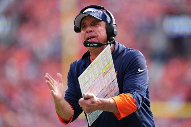 Denver Broncos head coach Sean Payton gestures during the first half of an NFL football game against the New York Giants in Denver, Sunday, Oct. 19, 2025. (AP Photo/Jack Dempsey)