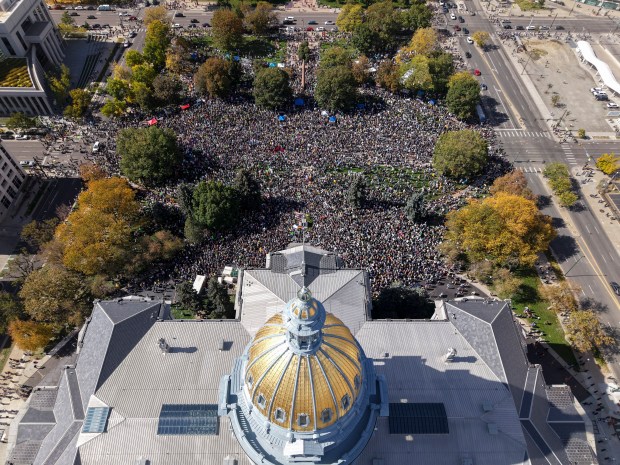Demonstrators gather in front of the Colorado State Capitol Building during a "No Kings" protest in Denver, on Saturday, Oct. 18, 2025. (Cheney Orr/The New York Times)