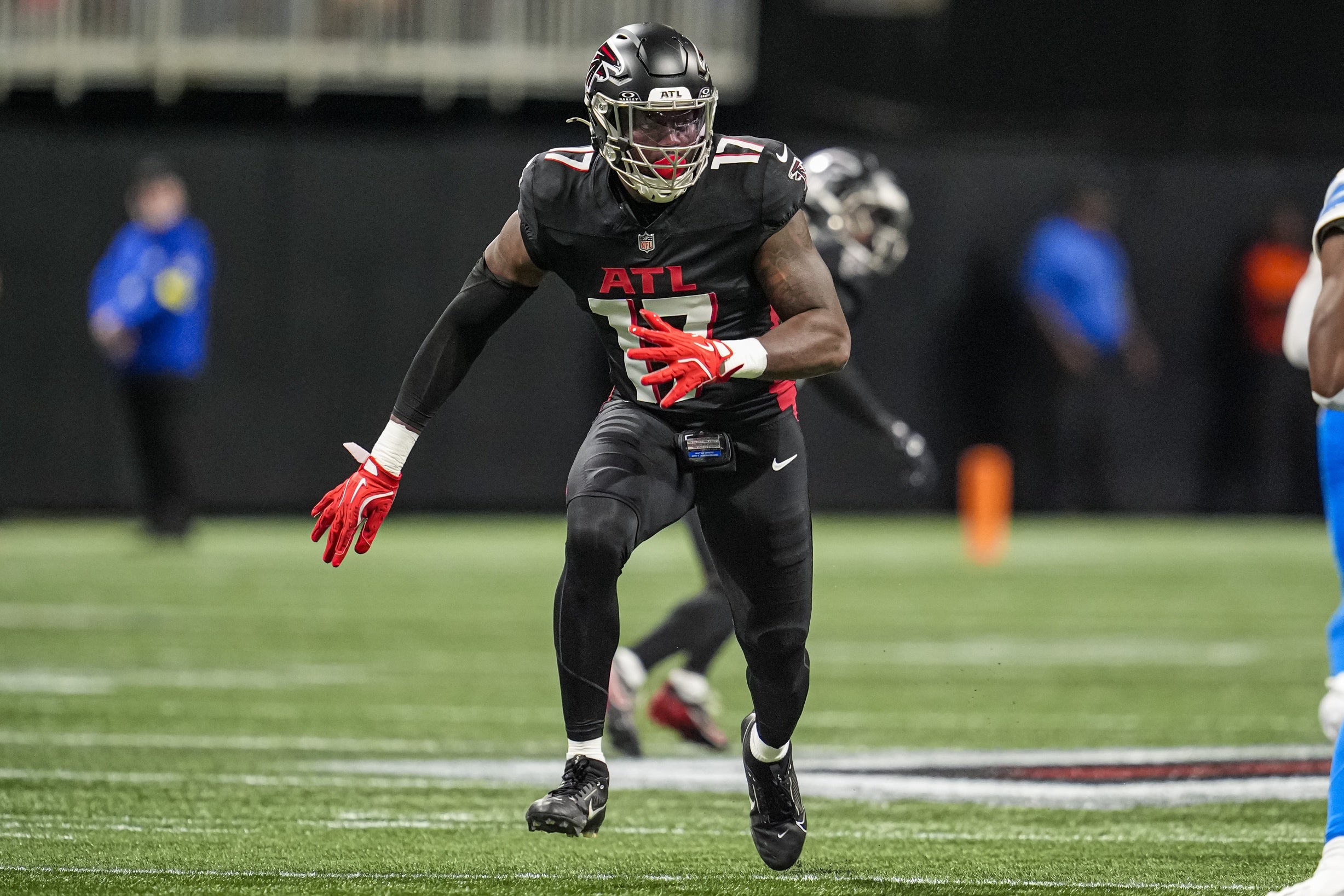 Aug 8, 2025; Atlanta, Georgia, USA; Atlanta Falcons linebacker Arnold Ebiketie (17) rushes the passer against the Detroit Lions during the first quarter at Mercedes-Benz Stadium. Mandatory Credit: Dale Zanine-Imagn Images
