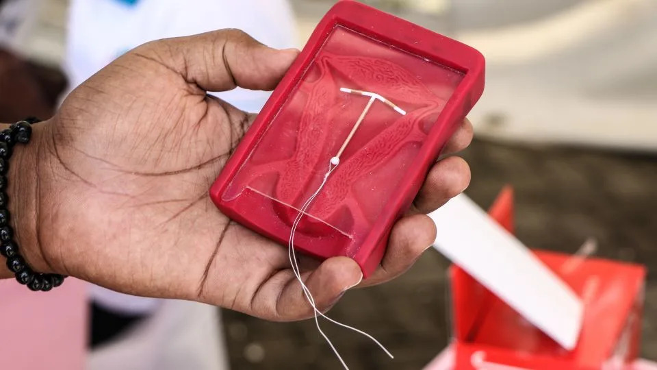 A close-up of a professional in Kenya demonstrating the correct placement of an Intrauterine Device (IUD) in 2023. - James Wakibia/SOPA Images/LightRocket/Getty Images