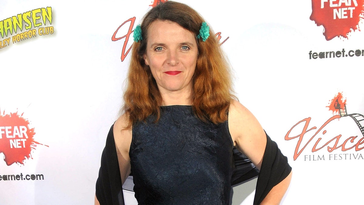 Abigail Hopkins wears black dress to event