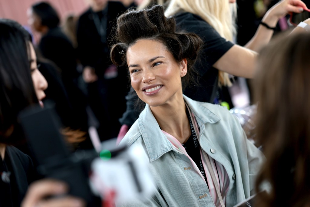 Adriana Lima gets glammed up backstage before the Victoria's Secret Fashion Show