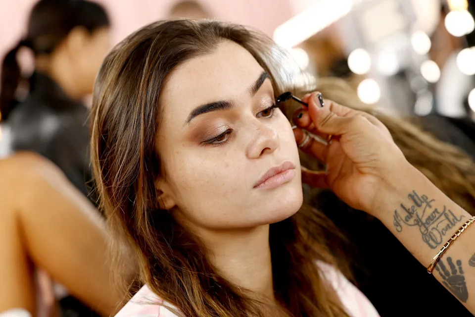 Barbie Ferreira prepares backstage.