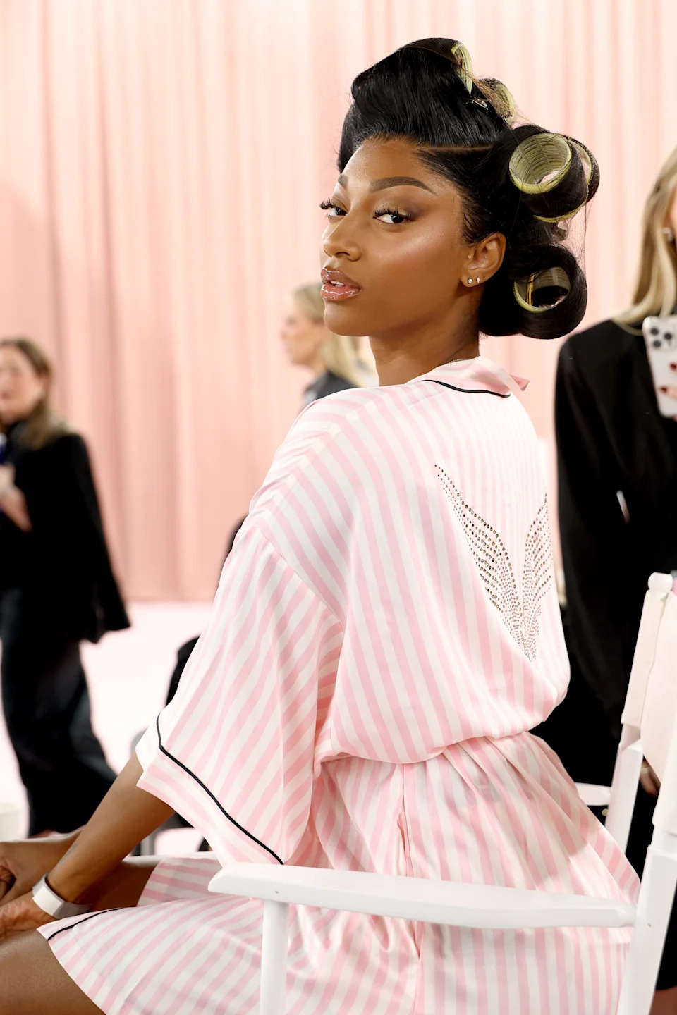 Angel Reese prepares backstage.
