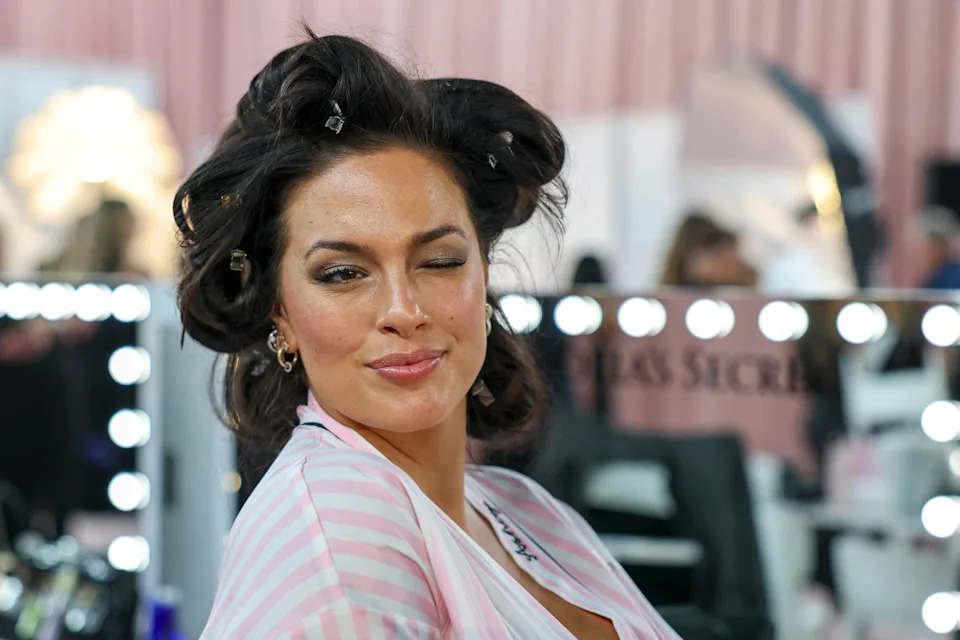 Model Ashley Graham prepares backstage at the Victoria's Secret Fashion Show 2025.