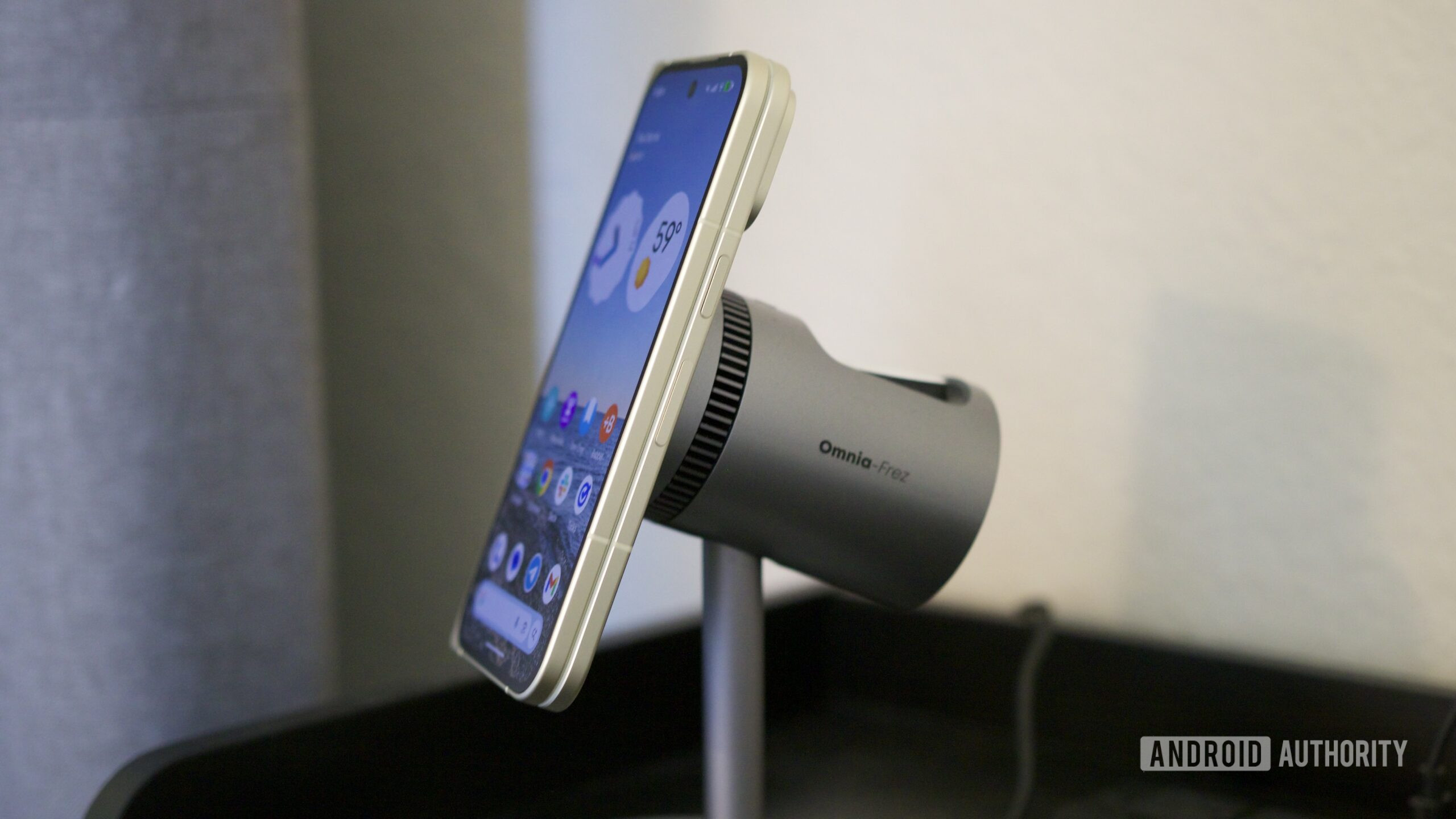 google pixel 10 pro fold qi2 magnetic charging stand 1 The Google Pixel 10 Pro Fold attached to a magnetic charging stand.