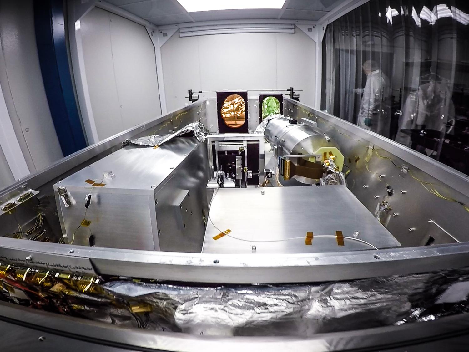 The Habitable Zone Planet Finder (HPF) provides the highest precision measurements to date of infrared signals from nearby stars. It's shown here during installation in its clean-room enclosure in the Hobby Eberly Telescope at McDonald Observatory. Image Credit: Guðmundur Stefánssonn / Penn State. CC BY-NC-ND 4.0
