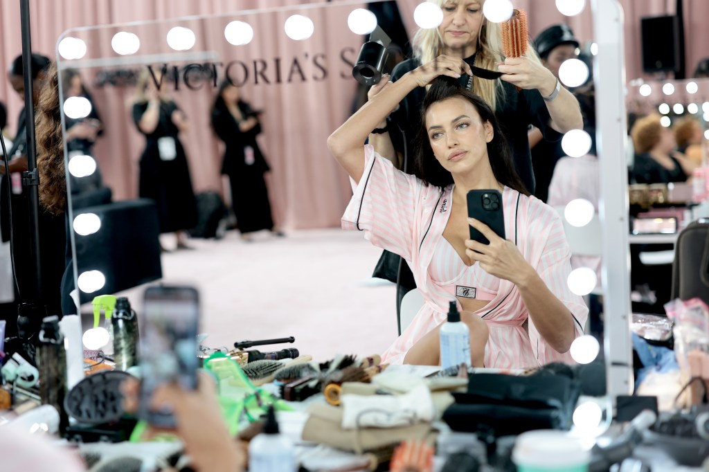 Irina Shayk gets glammed up backstage before the Victoria's Secret Fashion Show