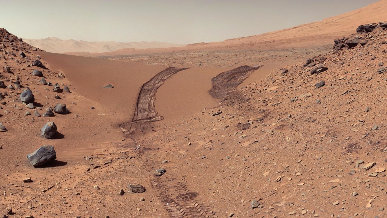 Mars: This photo was taken by NASA's Curiosity Rover in 2014. The image has been white balanced to show what the Martian surface materials would look like if under the light of Earth's sky.