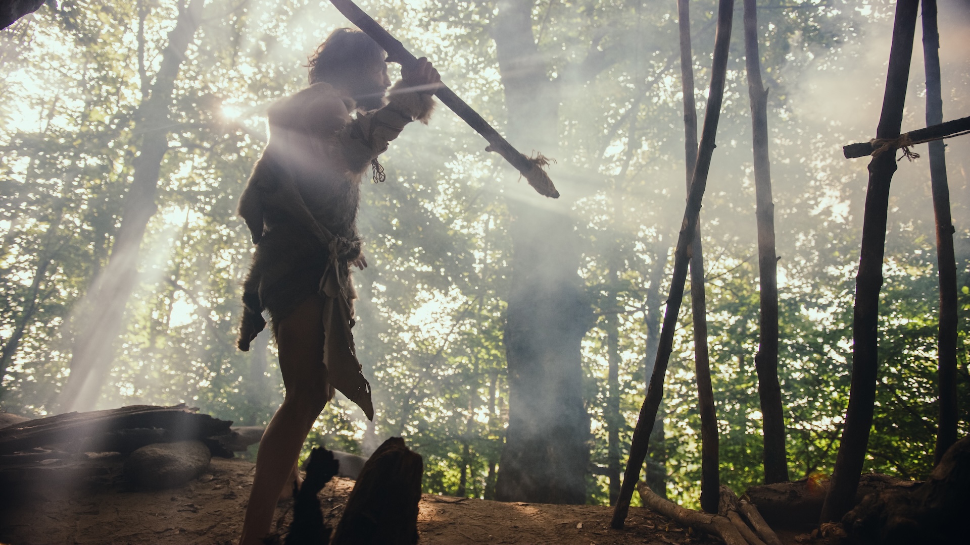 a recreation of a Neanderthal hunting in the forest
