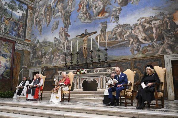 Pope Leo XIV and King Charles III pray together in the Sistine Chapel during a historic meeting at the Vatican on Thursday, Oct. 23, 2025. Credit: Vatican Media
