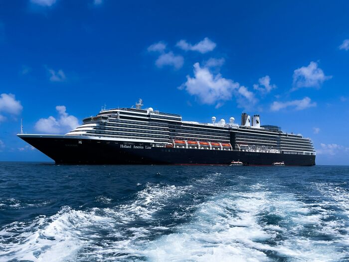 Cruise ship sailing on ocean under blue sky, illustrating moments when a patient with dementia said something unfiltered and funny.