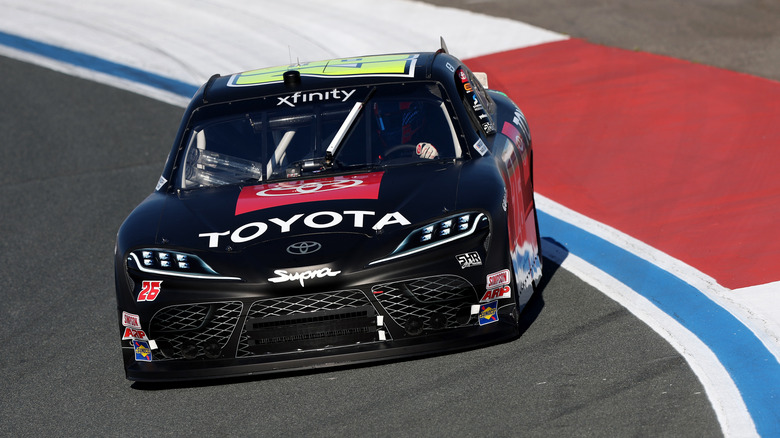 Toyota race car driving on track