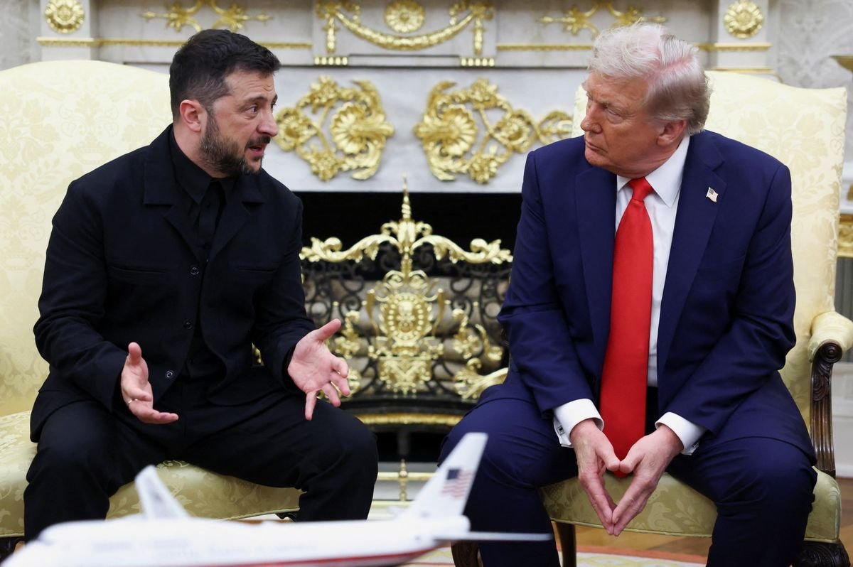 Ukrainian President Volodymyr Zelenskiy gestures next to U.S. President Donald Trump during a meeting at the Oval Office of the White House, amid negotiations to end the Russian war in Ukraine, in Washington, D.C., U.S., August 18, 2025.