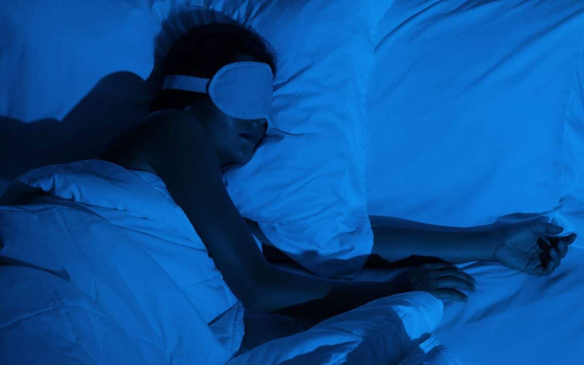 Woman Sleeping With A Sleep Mask On Her Eyes