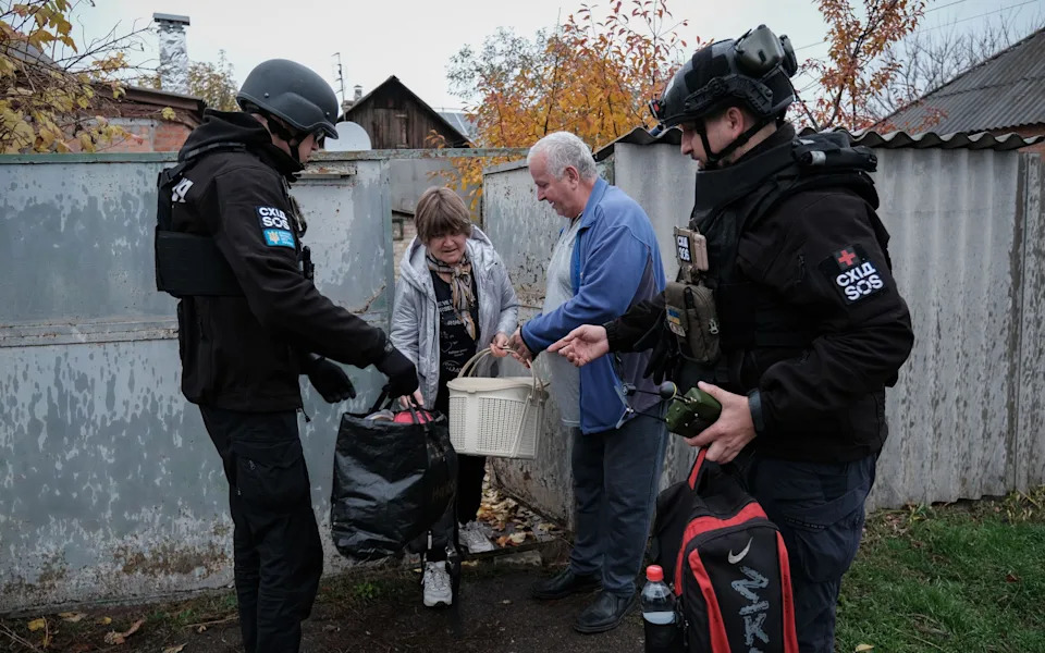 Civilians are evacuated from Druzhkivka in the Donetsk region on November 12