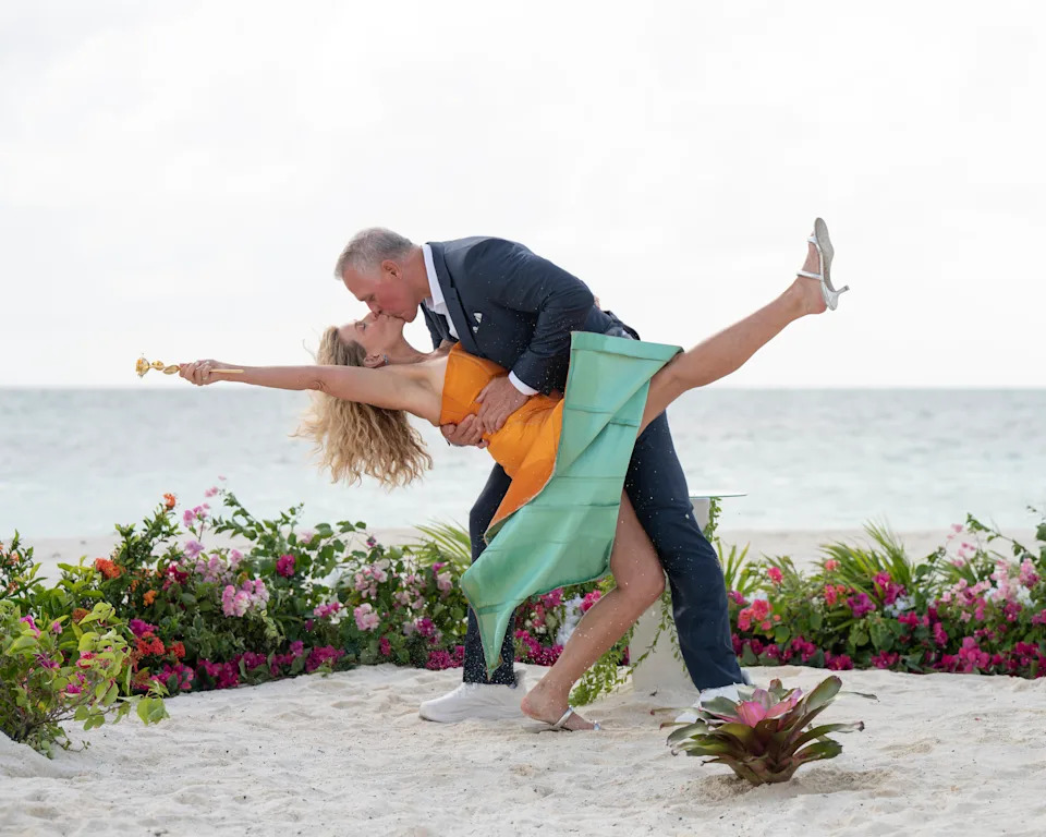 Peg Munson and Mel Owens kiss on the beach in Antigua during the season finale. (John Fleenor/Disney)