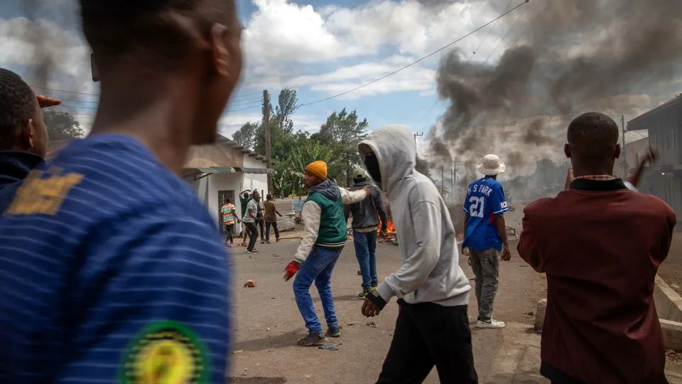 People protest in the streets of Arusha, Tanzania, on election day, Wednesday, October 29, 2025. (AP Photo) - AP