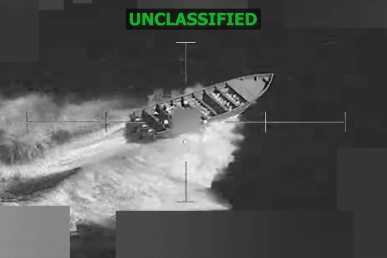 A black and white video still of a target on a boat