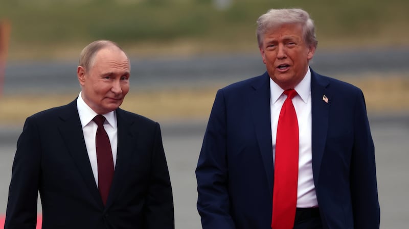 President Donald Trump welcomes Russian President Vladimir Putin to Joint Base Elmendorf-Richardson on August 15, 2025 in Anchorage, Alaska.