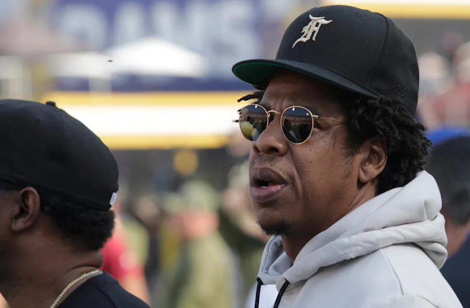 Rapper Jay-Z is spotted on the sidelines of the Los Angeles Rams vs the Seattle Seahawks football game at the Los Angeles Memorial Coliseum
