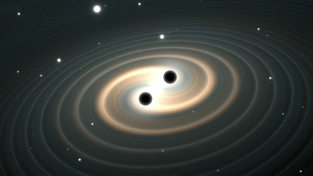  Scientists Finally Captured A Groundbreaking Image Of Two Black Holes Orbiting Each Other