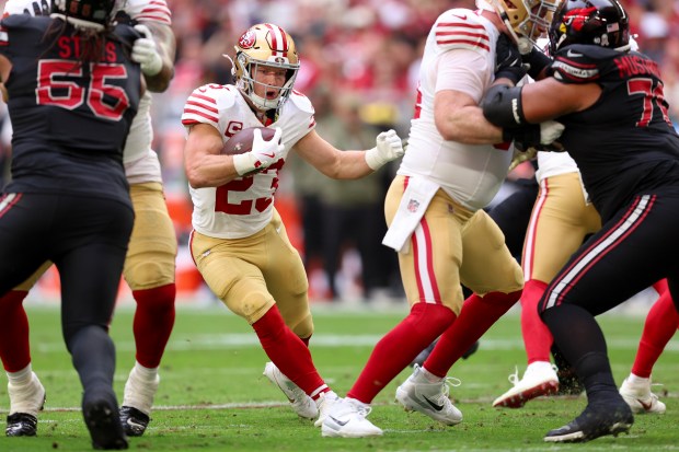 Christian McCaffrey #23 of the San Francisco 49ers carries the ball against the Arizona Cardinals during the second quarter at State Farm Stadium on Nov. 16, 2025 in Glendale, Arizona. (Photo by Mike Christy/Getty Images)