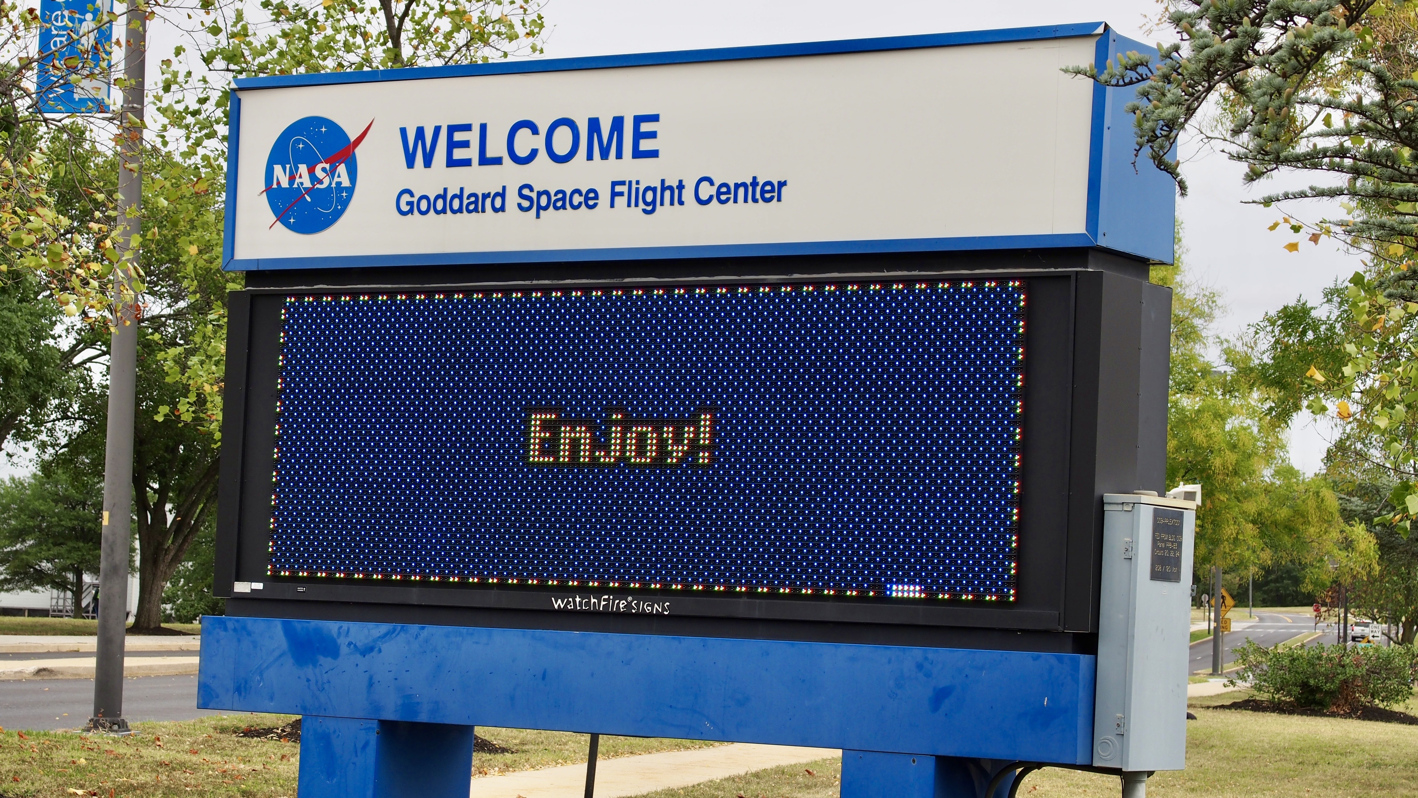 a nasa sign says Enjoy!