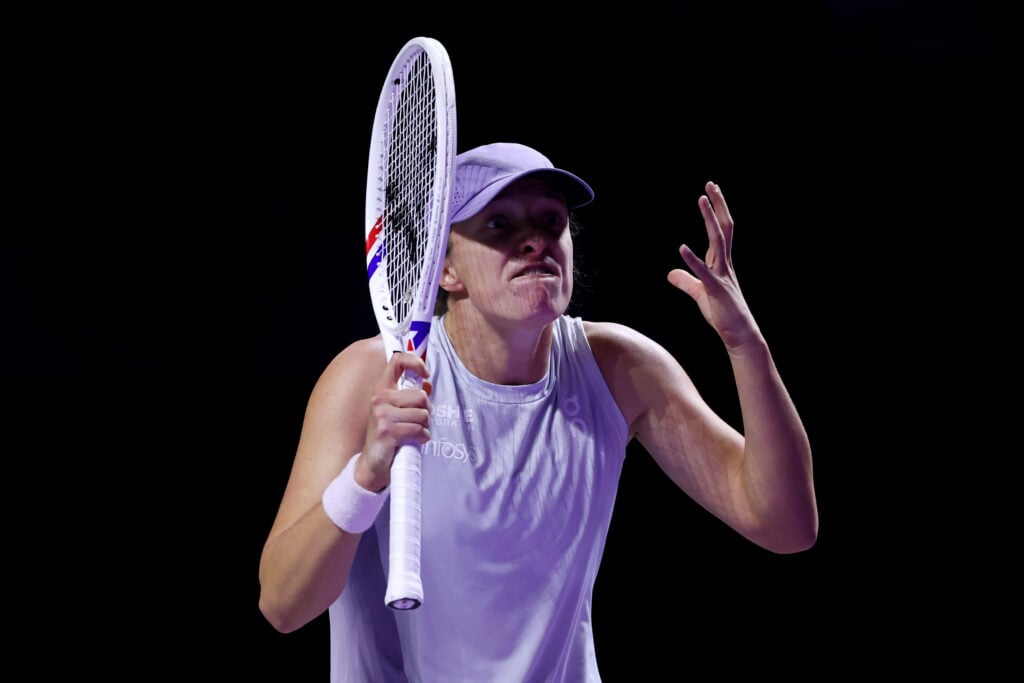 Iga Swiatek appears angry in her match against Amanda Anisimova at the 2025 WTA Finals in Riyadh, Saudi Arabia.
