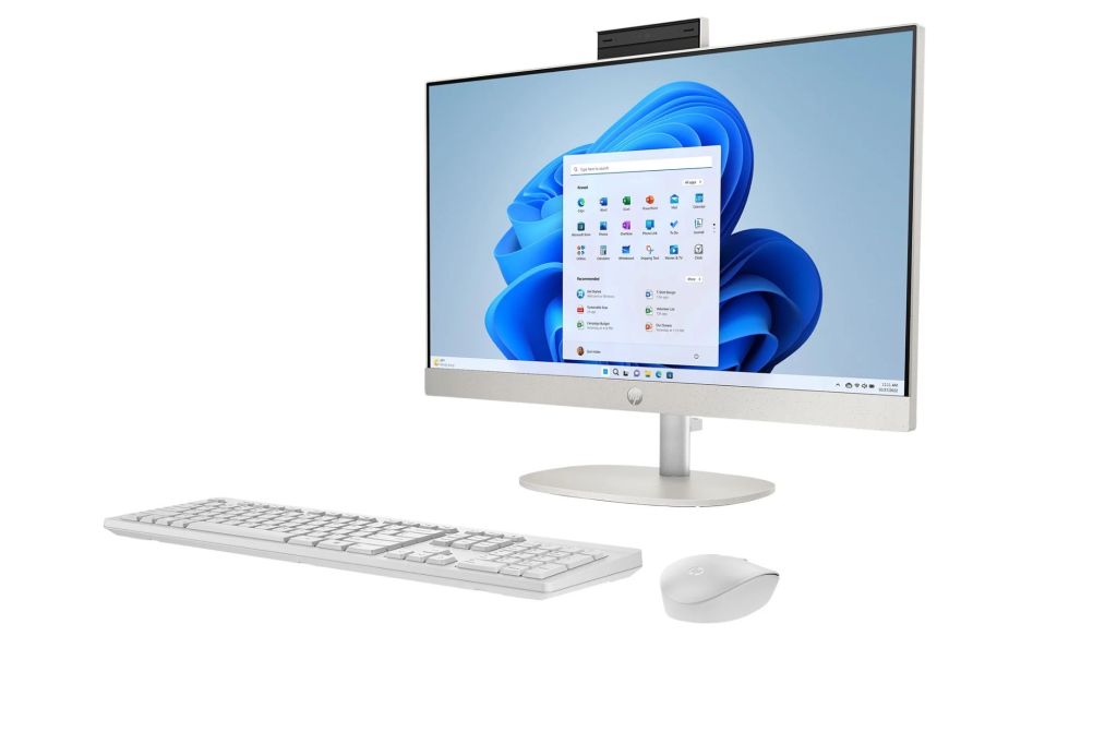 A white desktop with a keyboard and mouse.