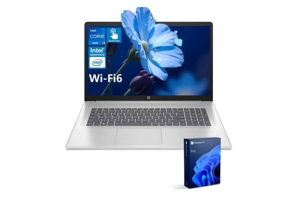 A HP laptop with a flower graphic.