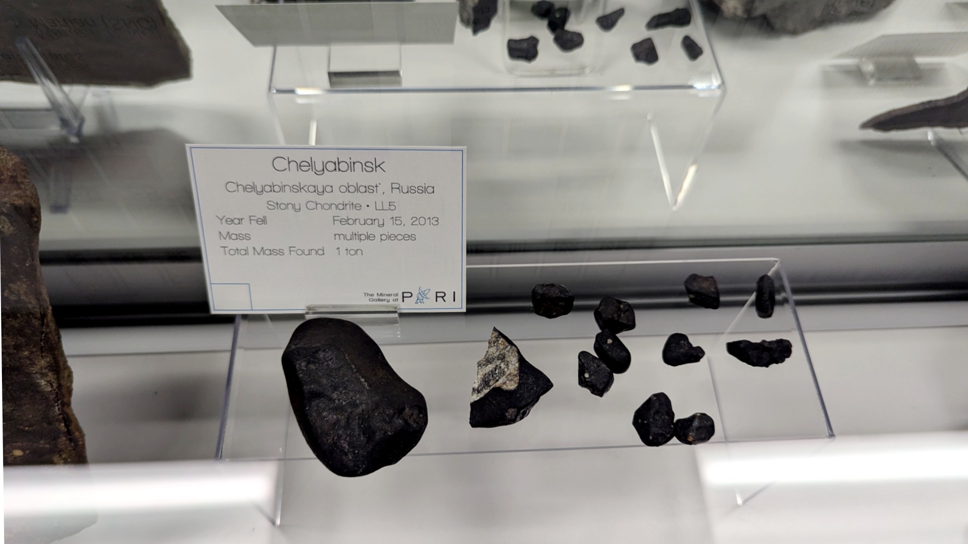 black rocks in a glass case