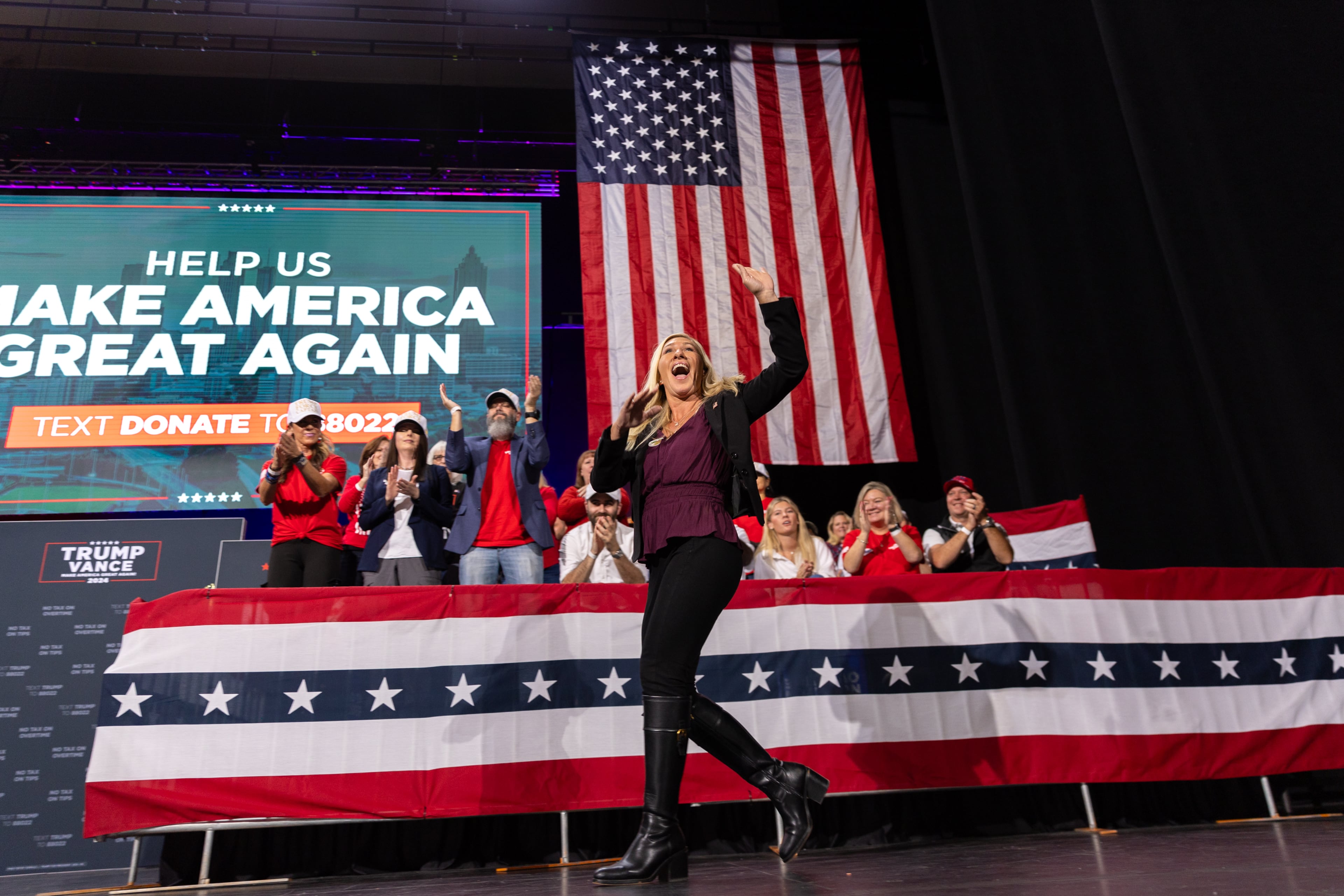 U.S. Rep. Marjorie Taylor Greene speaks at then-Republican presidential candidate Donald Trump’s rally at Cobb Energy Performing Arts Center on Tuesday, Oct. 15, 2024. After a dramatic turn against the president she once championed, she’s walking away from a Washington that she says “despised” her. (Arvin Temkar/AJC 2024)