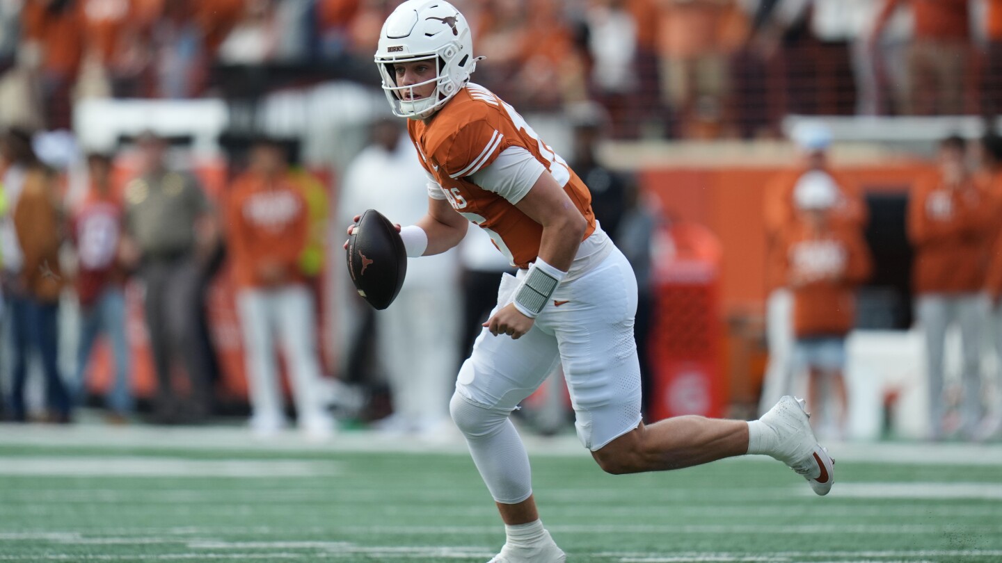  Manning throws for 3 TDs as No. 20 Texas hangs on to beat No. 9 Vanderbilt 34-31