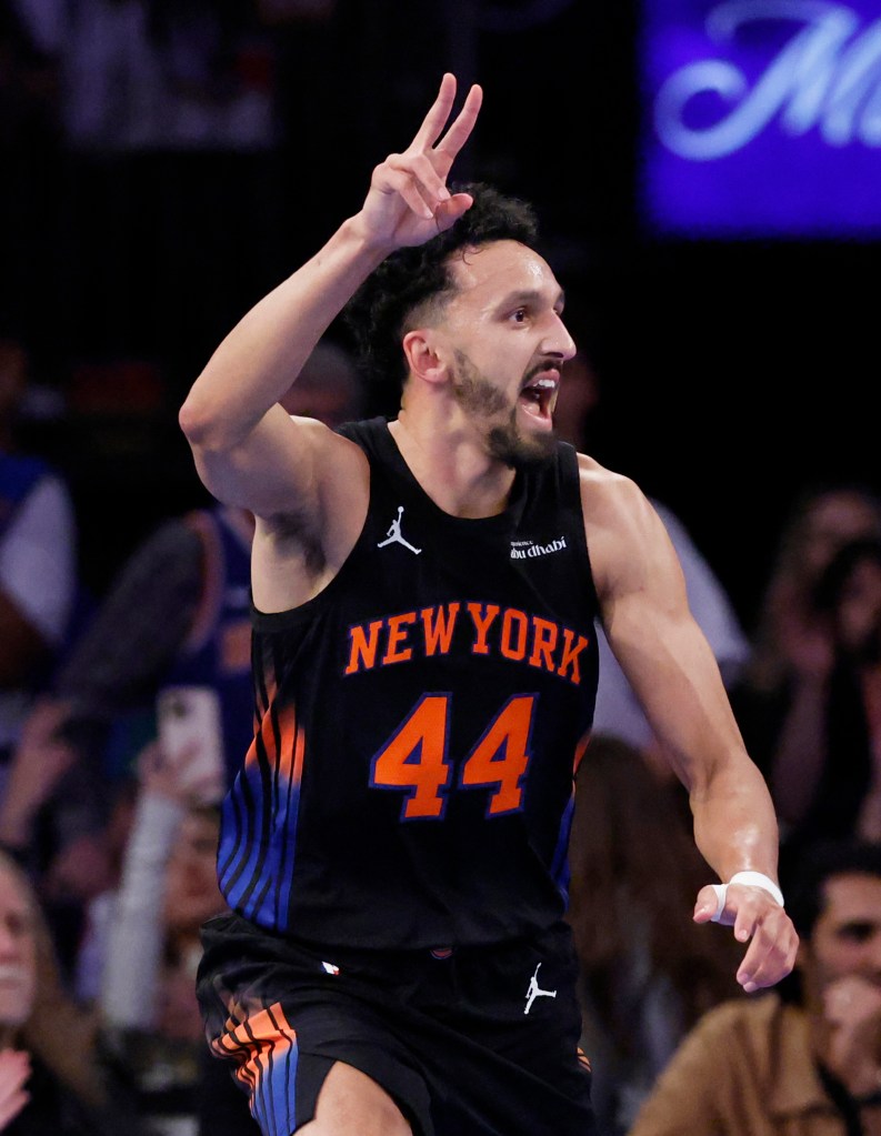 New York Knicks guard Landry Shamet reacts after his shot over Miami Heat defense in the first half at Madison Square Garden in New York, New York, November 14, 2025. 